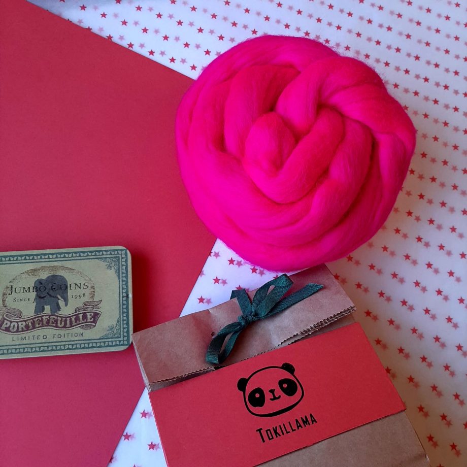 Lana merina extrafina peinada rosa flúor